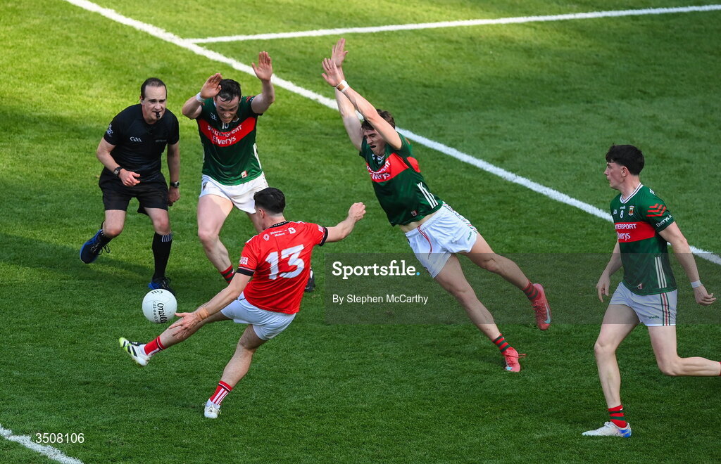 11 July 2026; Kieran McArdle of Louth in action against Stephen Coen, left, and Sam Callinan of Mayo during the GAA Football All-Ireland Senior Championship semi-final match between Mayo and Louth at Croke Park in Dublin. Photo by Stephen McCarthy/Sportsfile