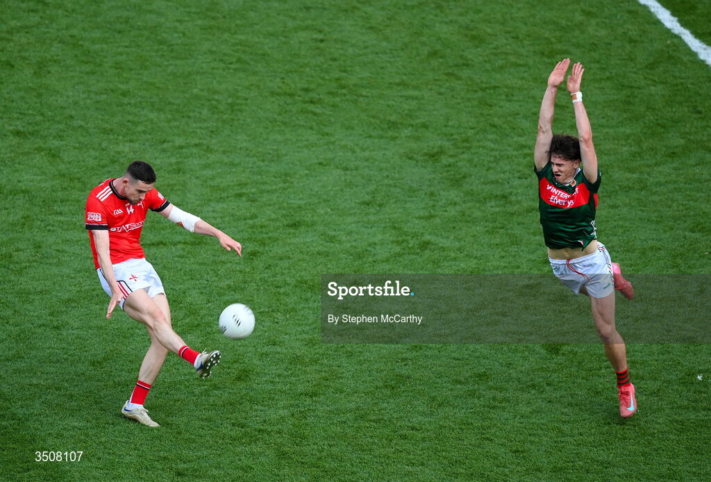 11 July 2026; Ciaran Downey of Louth in action against Sam Callinan of Mayo during the GAA Football All-Ireland Senior Championship semi-final match between Mayo and Louth at Croke Park in Dublin. Photo by Stephen McCarthy/Sportsfile