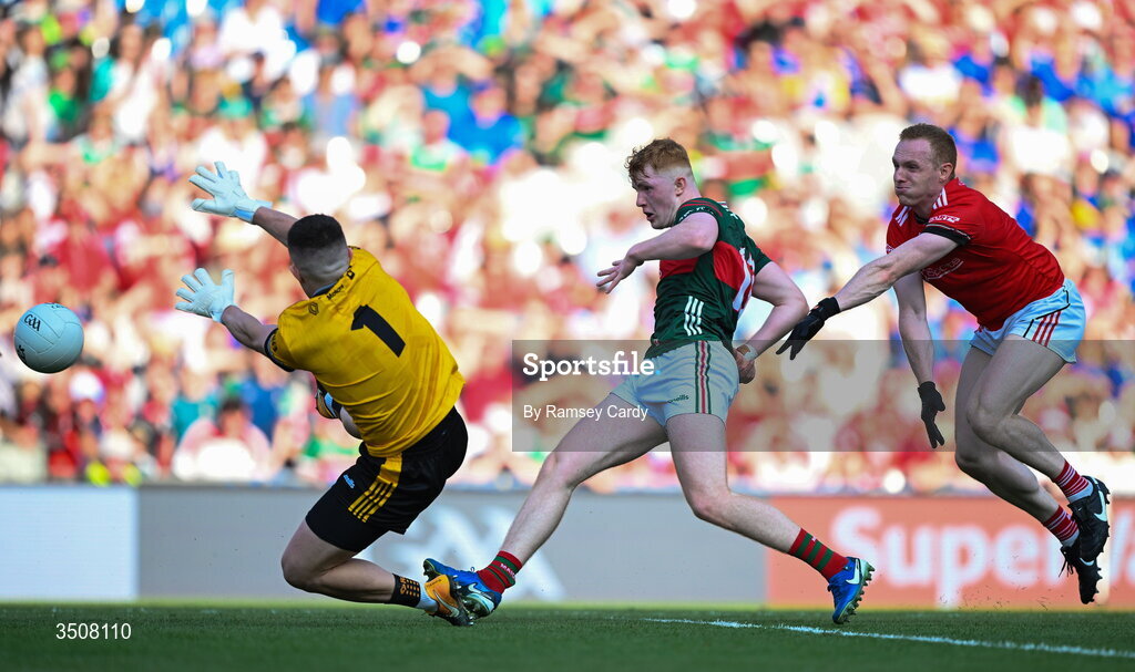 11 July 2026; Darragh Beirne of Mayo scores his side's second goal past Louth goalkeeper Niall McDonnell during the GAA Football All-Ireland Senior Championship semi-final match between Mayo and Louth at Croke Park in Dublin. Photo by Ramsey Cardy/Sportsfile