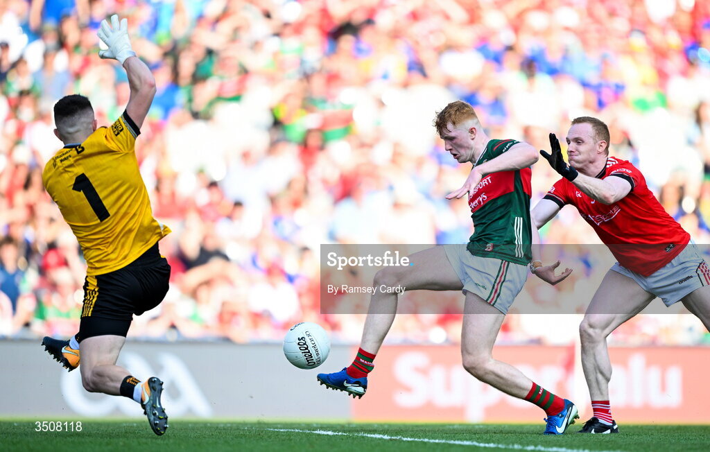 11 July 2026; Darragh Beirne of Mayo scores his side's second goal past Louth goalkeeper Niall McDonnell during the GAA Football All-Ireland Senior Championship semi-final match between Mayo and Louth at Croke Park in Dublin. Photo by Ramsey Cardy/Sportsfile