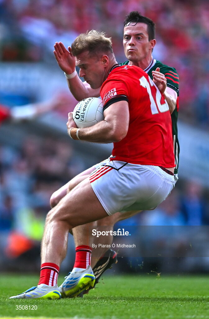 11 July 2026; Conor Grimes of Louth in action against Stephen Coen of Mayo during the GAA Football All-Ireland Senior Championship semi-final match between Mayo and Louth at Croke Park in Dublin. Photo by Piaras Ó Mídheach/Sportsfile