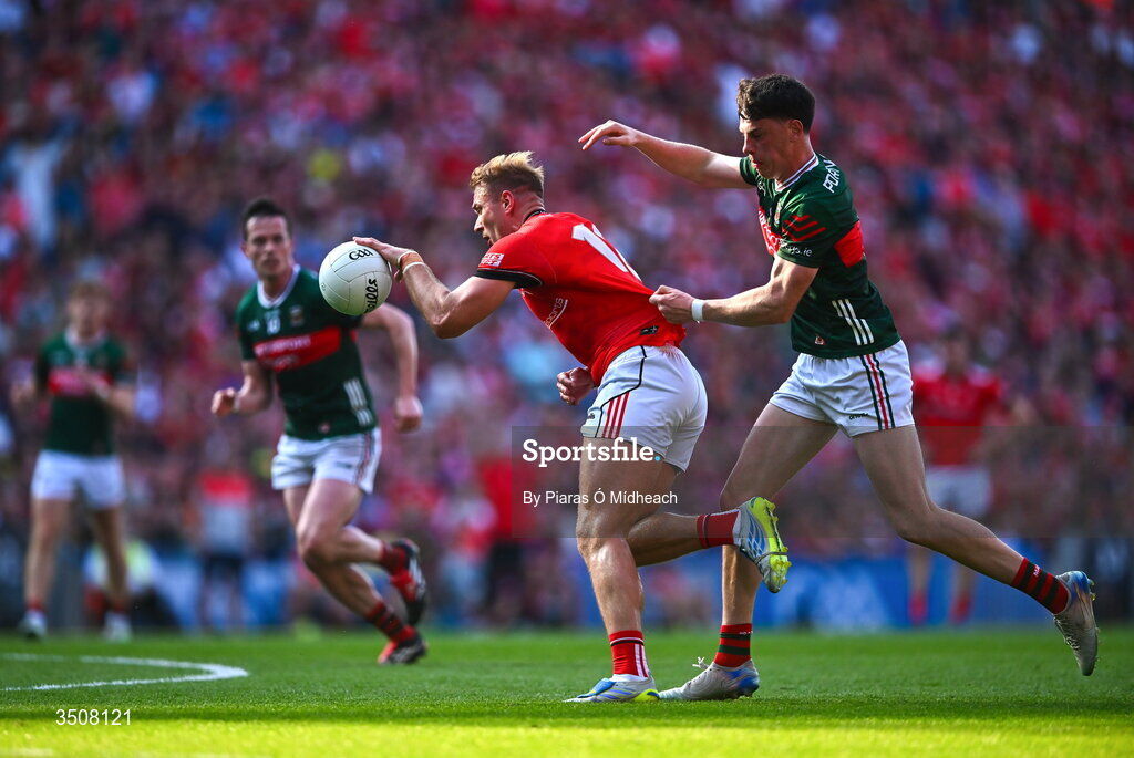 11 July 2026; Conor Grimes of Louth in action against Bob Tuohy of Mayo during the GAA Football All-Ireland Senior Championship semi-final match between Mayo and Louth at Croke Park in Dublin. Photo by Piaras Ó Mídheach/Sportsfile