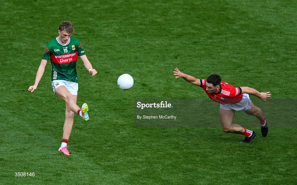 11 July 2026; Kobe McDonald of Mayo kicks a point despite the efforts of Emmet Carolan of Louth during the GAA Football All-Ireland Senior Championship semi-final match between Mayo and Louth at Croke Park in Dublin. Photo by Stephen McCarthy/Sportsfile