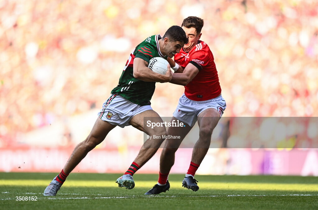 11 July 2026; Tommy Conroy of Mayo is tackled by Emmet Carolan of Louth during the GAA Football All-Ireland Senior Championship semi-final match between Mayo and Louth at Croke Park in Dublin. Photo by Ben McShane/Sportsfile