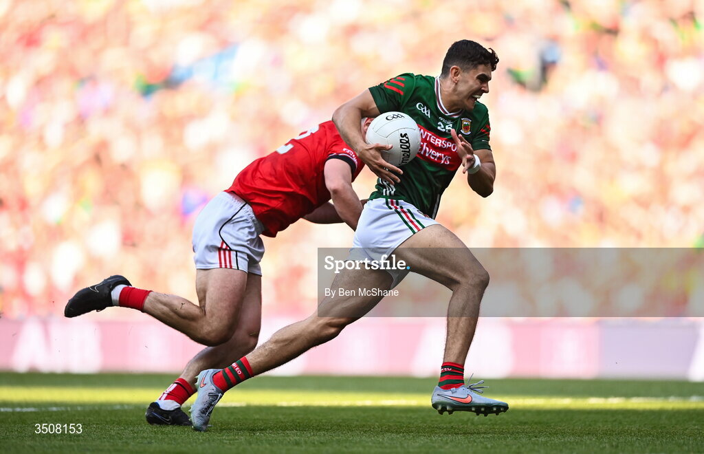 11 July 2026; Tommy Conroy of Mayo is tackled by Emmet Carolan of Louth during the GAA Football All-Ireland Senior Championship semi-final match between Mayo and Louth at Croke Park in Dublin. Photo by Ben McShane/Sportsfile