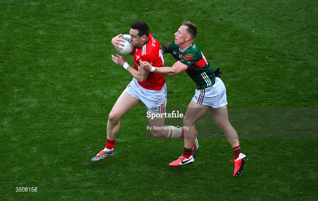 11 July 2026; Tommy Durnin of Louth in action against Ryan O'Donoghue of Mayo during the GAA Football All-Ireland Senior Championship semi-final match between Mayo and Louth at Croke Park in Dublin. Photo by Stephen McCarthy/Sportsfile