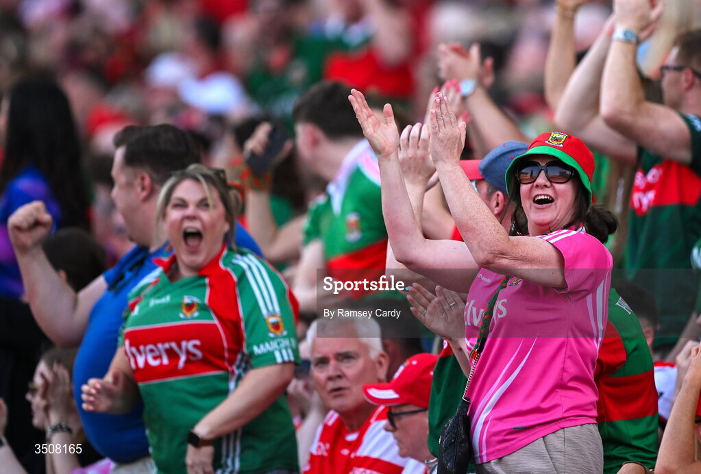 11 July 2026; Mayo supporters celebrate their side's third goal, scored by Conor Loftus, during the GAA Football All-Ireland Senior Championship semi-final match between Mayo and Louth at Croke Park in Dublin. Photo by Ramsey Cardy/Sportsfile