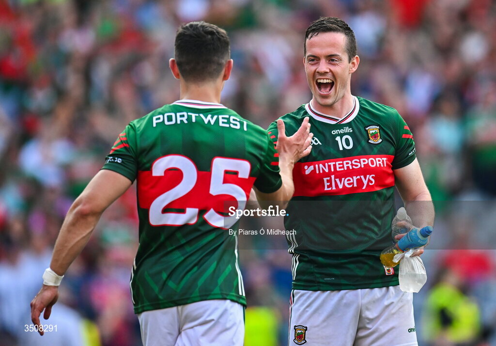 11 July 2026; Mayo players Stephen Coen, 10, and Tommy Conroy celebrate after victory in the GAA Football All-Ireland Senior Championship semi-final match between Mayo and Louth at Croke Park in Dublin. Photo by Piaras Ó Mídheach/Sportsfile