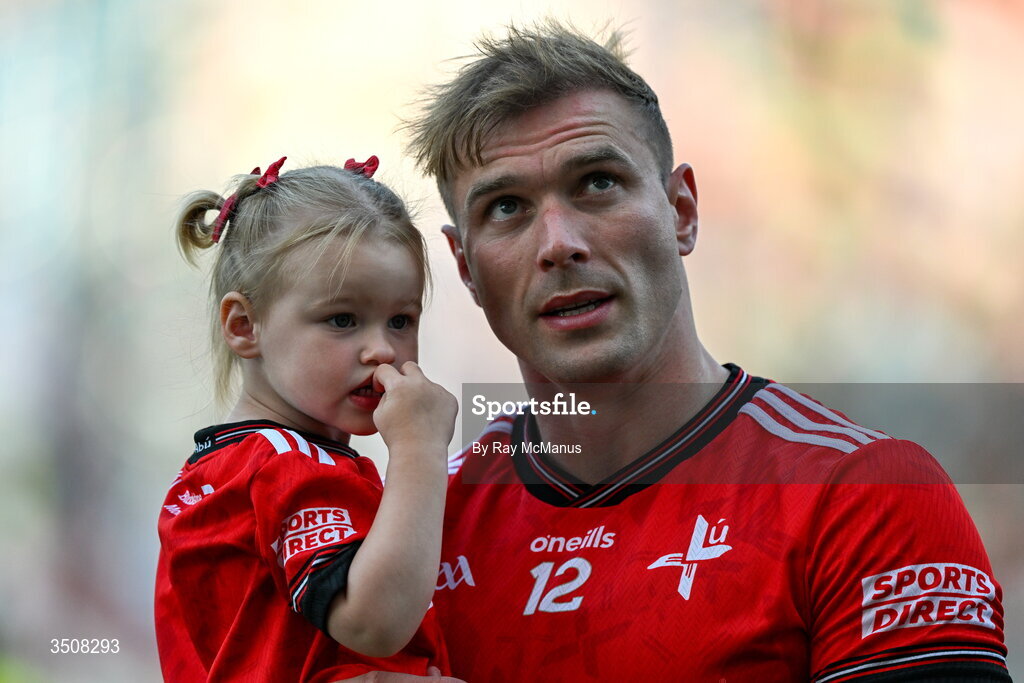 11 July 2026; Conor Grimes of Louth and his daughter Izzy, two years, after the GAA Football All-Ireland Senior Championship semi-final match between Mayo and Louth at Croke Park in Dublin. Photo by Ray McManus/Sportsfile