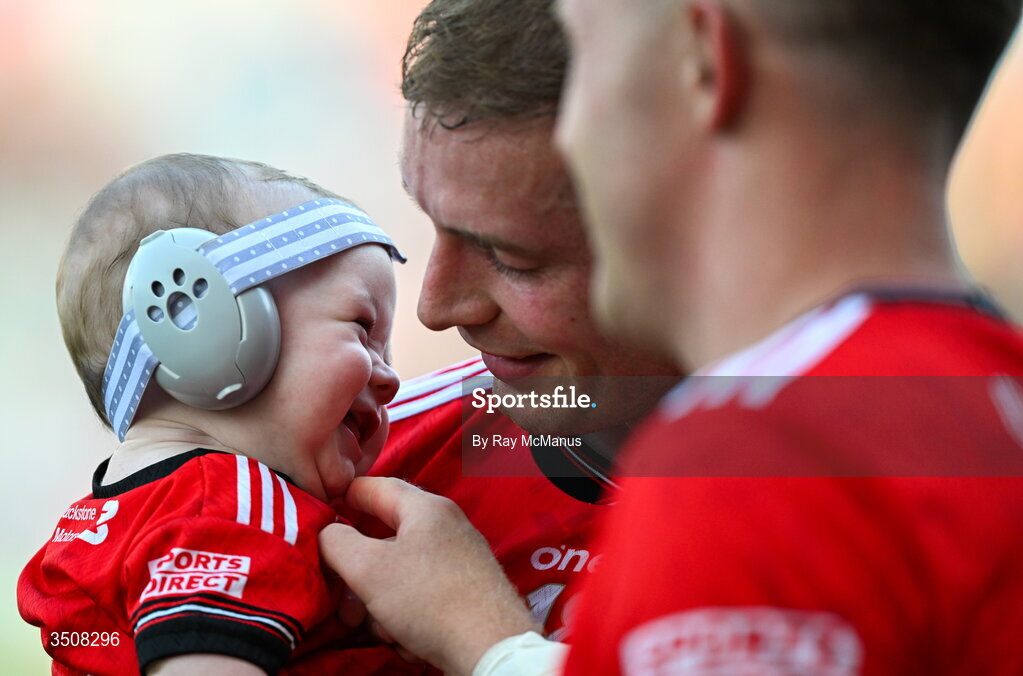 11 July 2026; Five month old Conan Byrne with her dad Ciaran Byrne and his team mate Ryan Burns of Louth after the GAA Football All-Ireland Senior Championship semi-final match between Mayo and Louth at Croke Park in Dublin. Photo by Ray McManus/Sportsfile