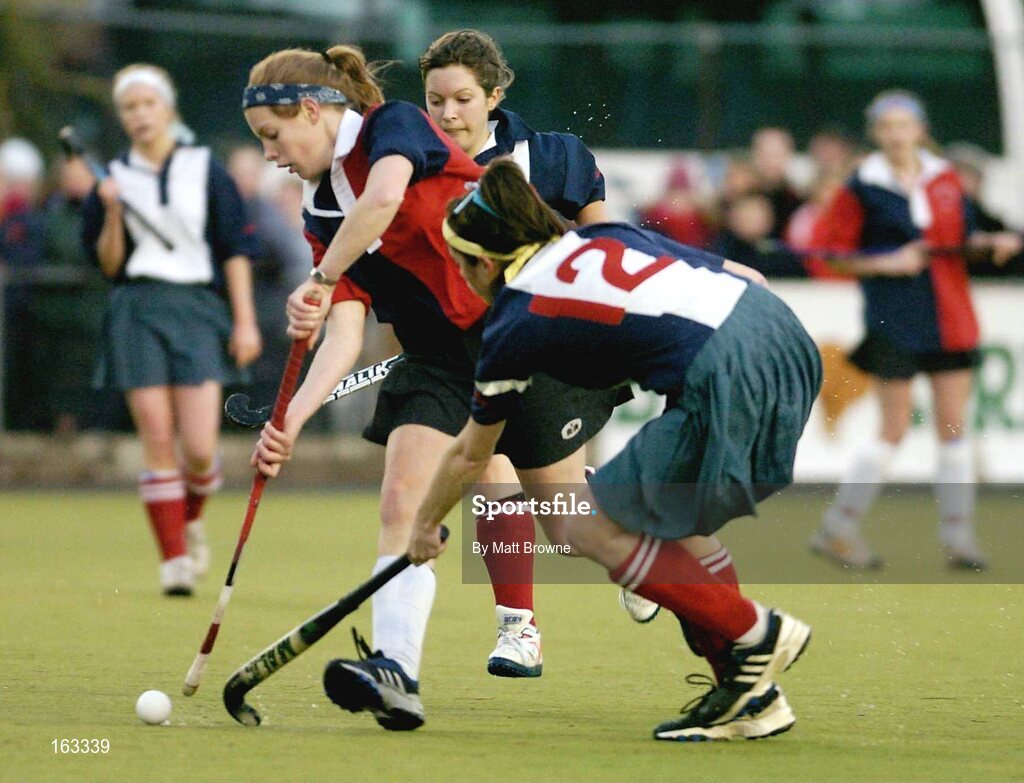 17 December 2004; Claire Hearnden, Wesley College, in action against Katie Hutch (12), Mount Anville. Schoolgirls Leinster Premier League, Mount Anville v Wesley College, Grange Road, Dublin. Picture credit; Matt Browne / SPORTSFILE