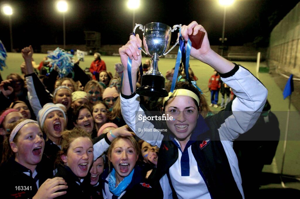 17 December 2004; Katie Hutch, Mount Anville captain, lifts the cup after victory over Wesley College. Schoolgirls Leinster Premier League, Mount Anville v Wesley College, Grange Road, Dublin. Picture credit; Matt Browne / SPORTSFILE