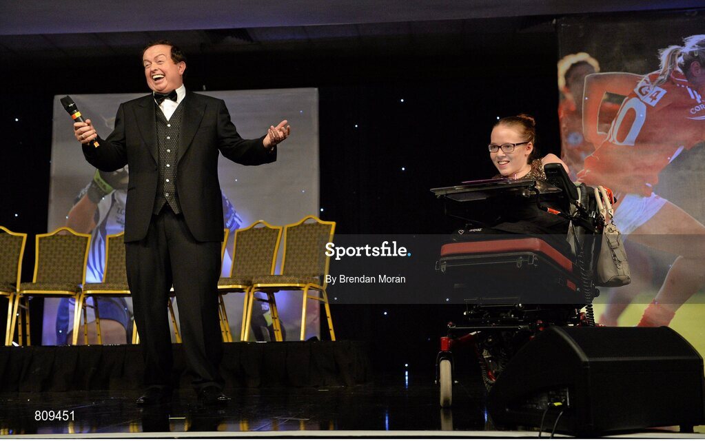 9 November 2013; Special guest Joanne O'Riordan with MC Marty Morrissey during the TG4 Ladies Football All-Star Awards. TG4 Ladies Football All-Star Awards 2013, Citywest Hotel, Saggart, Co. Dublin. Picture credit: Brendan Moran / SPORTSFILE