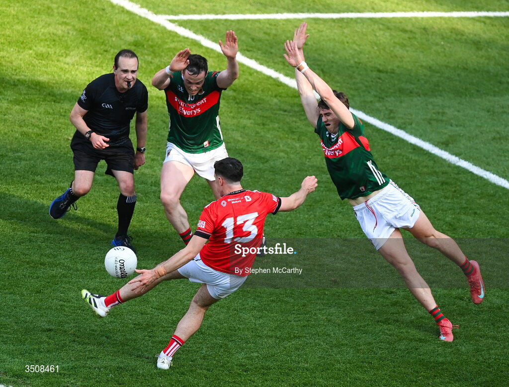 11 July 2026; Kieran McArdle of Louth in action against Stephen Coen, left, and Sam Callinan of Mayo during the GAA Football All-Ireland Senior Championship semi-final match between Mayo and Louth at Croke Park in Dublin.  Photo by Stephen McCarthy/Sportsfile