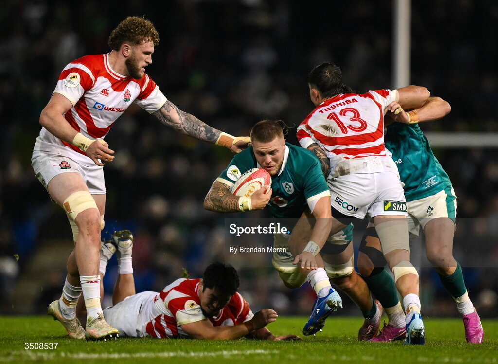 11 July 2026; Sean Jansen of Ireland is tackled by Dylan Riley of Japan during the 2026 Nations Championship Round Two match between Japan and Ireland at McDonald Jones Stadium in Newcastle, Australia. Photo by Brendan Moran/Sportsfile