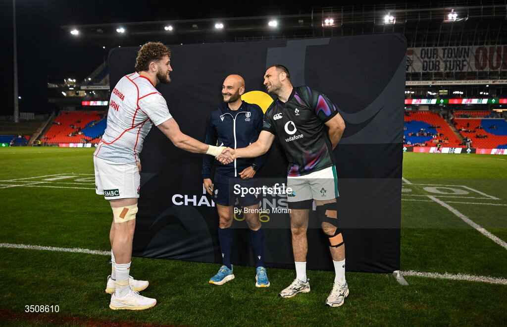 11 July 2026; Japan captain Warner Dearns and Ireland captain Tadhg Beirne shake hands, in the company of referee Andrea Piardi, before the 2026 Nations Championship Round Two match between Japan and Ireland at McDonald Jones Stadium in Newcastle, Australia. Photo by Brendan Moran/Sportsfile