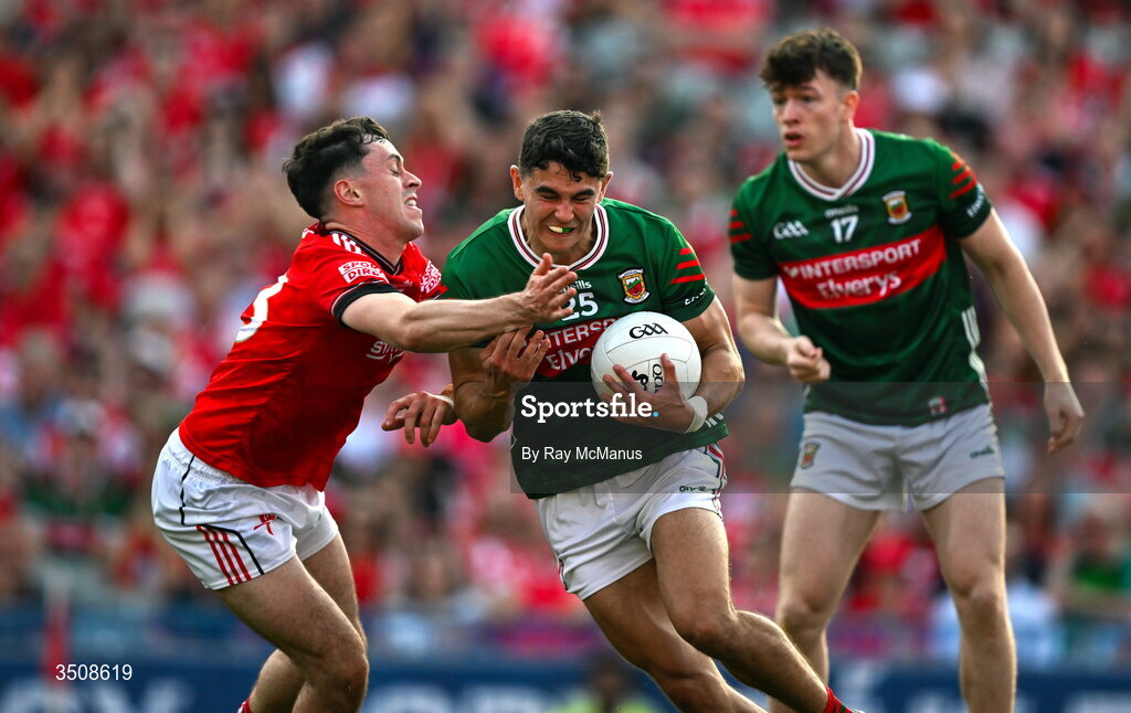 11 July 2026; Tommy Conroy of Mayo is tackled by Kieran McArdle of Louth during the GAA Football All-Ireland Senior Championship semi-final match between Mayo and Louth at Croke Park in Dublin. Photo by Ray McManus/Sportsfile
