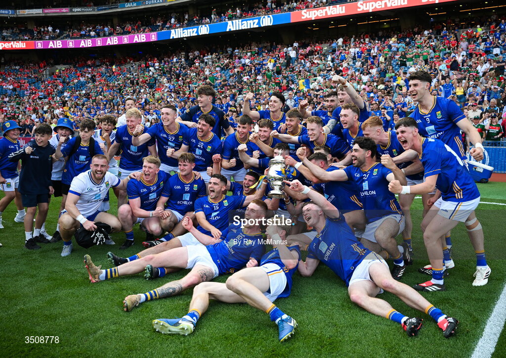 11 July 2026; Wicklow players and supporters celebrate with the Tailteann Cup after the Tailteann Cup final match between Down and Wicklow at Croke Park in Dublin. Photo by Ray McManus/Sportsfile