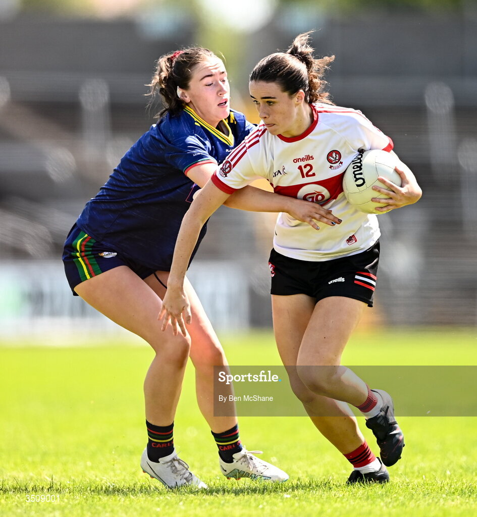 12 July 2026; Annie Ní Lochlainn of Derry is tackled by Síofra O'Neill of Carlow during the LGFA TG4 All-Ireland Junior Championship semi-final match between Carlow and Derry at Kingspan Breffni in Cavan. Photo by Ben McShane/Sportsfile