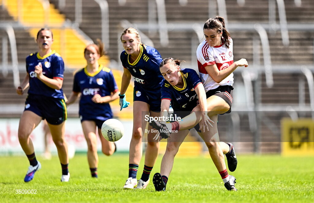 12 July 2026; Annie Ní Lochlainn of Derry has a shot on goal despite the tackle of Niamh Forde of Carlow during the LGFA TG4 All-Ireland Junior Championship semi-final match between Carlow and Derry at Kingspan Breffni in Cavan. Photo by Ben McShane/Sportsfile