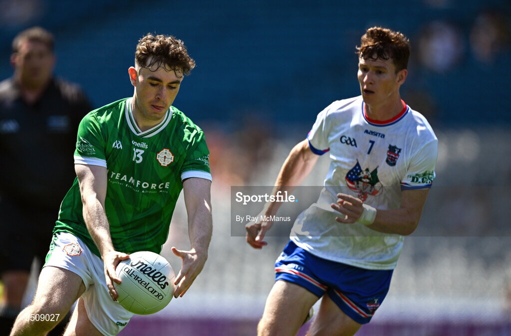 12 July 2026; Shaun McCready of London, under pressure from Brian McDaid of USGAA, prepares to kick the ball which ultimately landed in the back of the net for a goal, in the 30th minute, during the GAA Football All-Ireland Junior Championship Final match between USGAA and London at Croke Park in Dublin. Photo by Ray McManus/Sportsfile