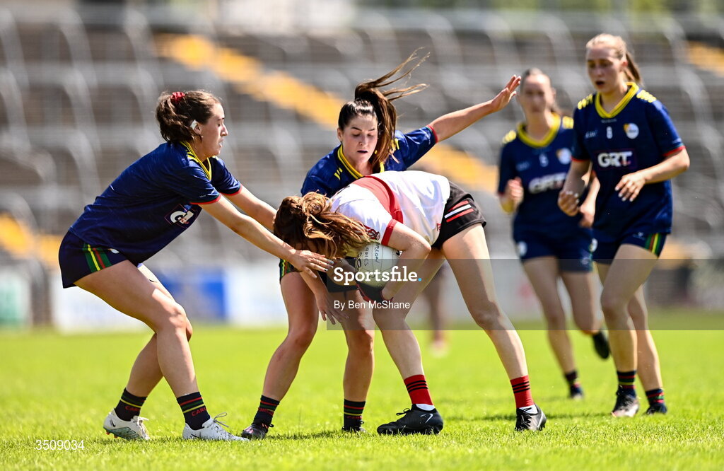 12 July 2026; Orla McGeough of Derry is tackled by Ruth Bermingham, right, and Síofra O'Neill of Carlow during the LGFA TG4 All-Ireland Junior Championship semi-final match between Carlow and Derry at Kingspan Breffni in Cavan. Photo by Ben McShane/Sportsfile