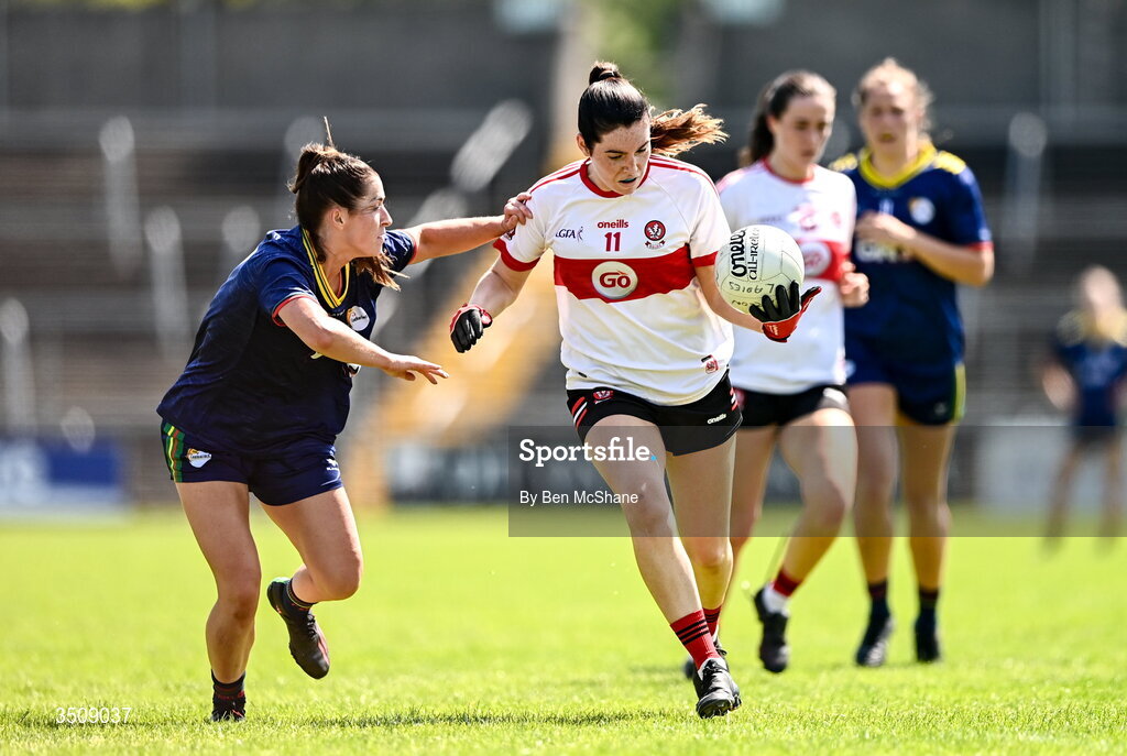 12 July 2026; Orla McGeough of Derry is tackled by Ruth Bermingham of Carlow during the LGFA TG4 All-Ireland Junior Championship semi-final match between Carlow and Derry at Kingspan Breffni in Cavan. Photo by Ben McShane/Sportsfile