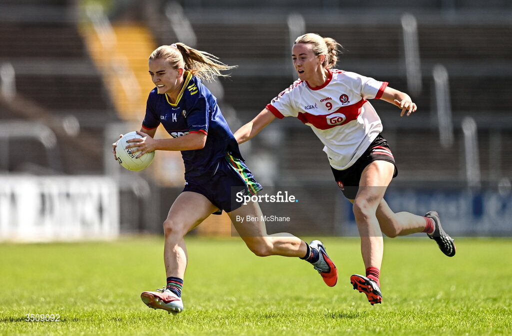 12 July 2026; Sara Doyle of Carlow in action against Kate Hargan of Derry during the LGFA TG4 All-Ireland Junior Championship semi-final match between Carlow and Derry at Kingspan Breffni in Cavan. Photo by Ben McShane/Sportsfile