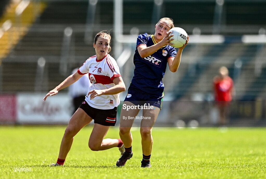 12 July 2026; Róisín Bailey of Carlow in action against Sarah Heron of Derry during the LGFA TG4 All-Ireland Junior Championship semi-final match between Carlow and Derry at Kingspan Breffni in Cavan. Photo by Ben McShane/Sportsfile