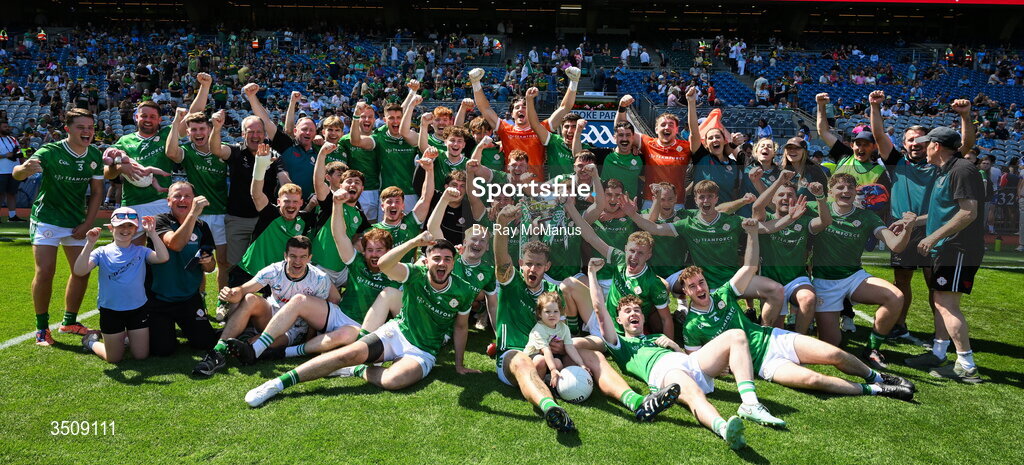 12 July 2026; The London players and officials celebrate with the cup after the GAA Football All-Ireland Junior Championship Final match between USGAA and London at Croke Park in Dublin. Photo by Ray McManus/Sportsfile