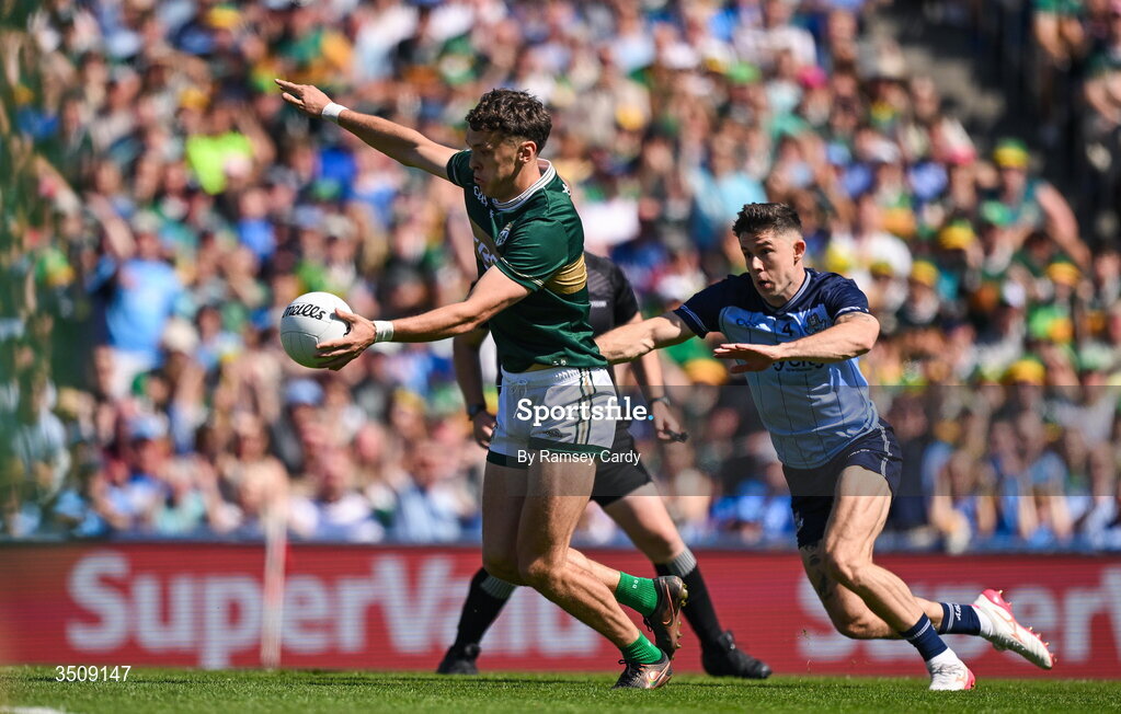 12 July 2026; David Clifford of Kerry shoots to score his side's first goal despite the attention of David Byrne of Dublin during the GAA Football All-Ireland Senior Championship semi-final match between Dublin and Kerry at Croke Park in Dublin. Photo by Ramsey Cardy/Sportsfile