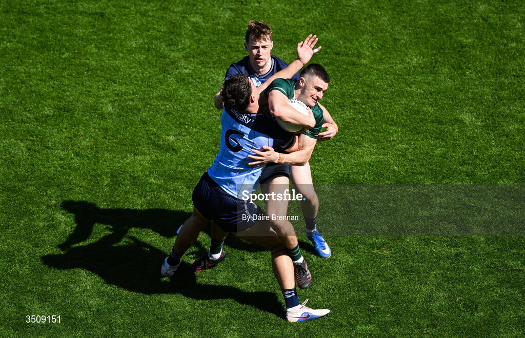 12 July 2026; Seán O'Shea of Kerry in action against Eoin Kennedy, left, and Theo Clancy during the GAA Football All-Ireland Senior Championship semi-final match between Dublin and Kerry at Croke Park in Dublin. Photo by Dáire Brennan/Sportsfile