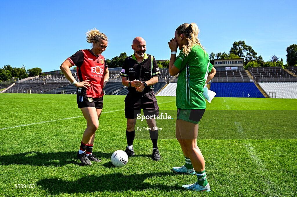 12 July 2026; Referee Gus Chapman with captains Laoise Duffy of Down and Shannan McQuade of Fermanagh before the LGFA TG4 All-Ireland Intermediate Championship semi-final match between Down and Fermanagh at St Tiernach’s Park in Clones, Monaghan. Photo by Tyler Miller/Sportsfile