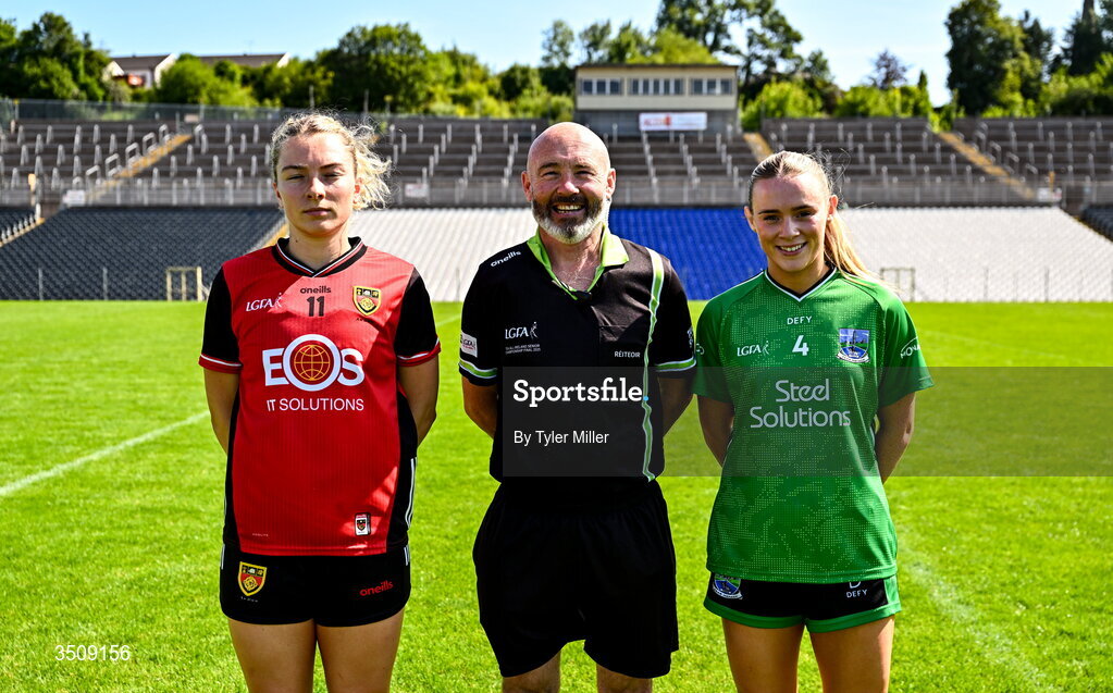 12 July 2026; Referee Gus Chapman with captains Laoise Duffy of Down and Shannan McQuade of Fermanagh before the LGFA TG4 All-Ireland Intermediate Championship semi-final match between Down and Fermanagh at St Tiernach’s Park in Clones, Monaghan. Photo by Tyler Miller/Sportsfile