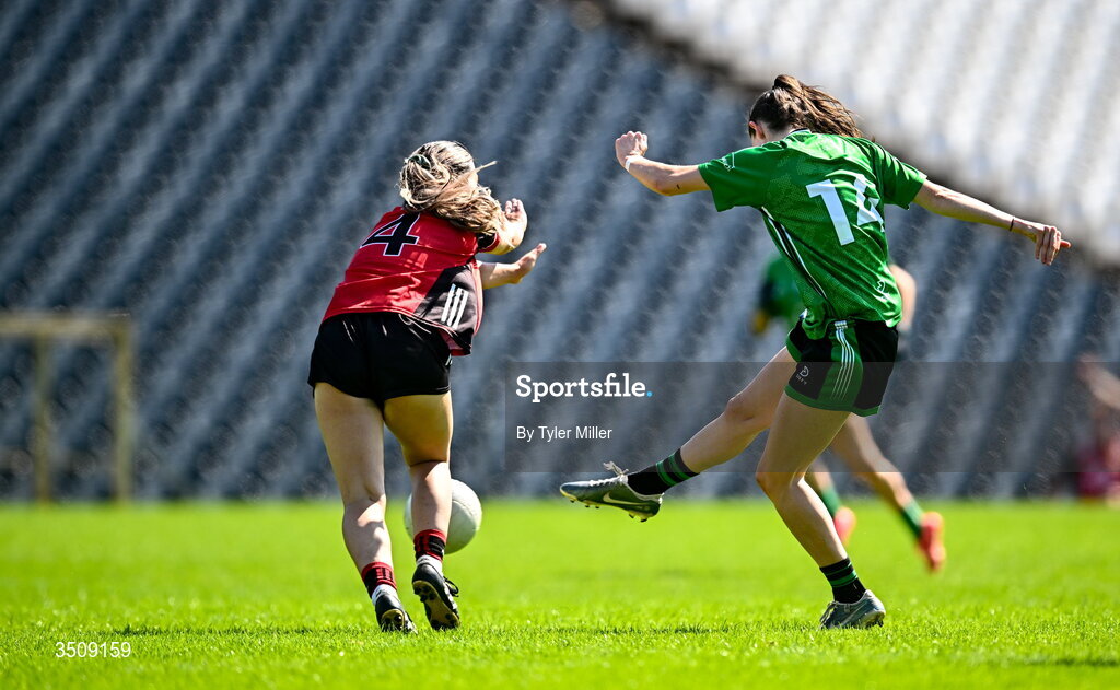 12 July 2026; Eimear Smyth of Fermanagh shoots to score her side's first goal despite the efforts of Aimee Greene of Down during the LGFA TG4 All-Ireland Intermediate Championship semi-final match between Down and Fermanagh at St Tiernach’s Park in Clones, Monaghan. Photo by Tyler Miller/Sportsfile