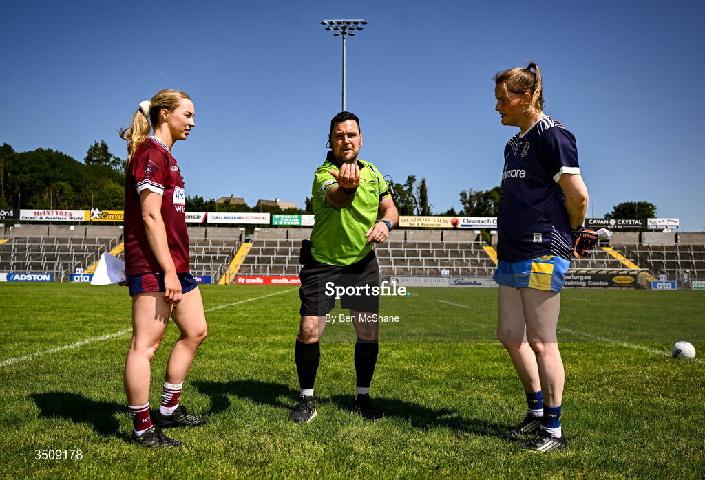 12 July 2026; Referee David Hurson performs the coin-toss in the company of Westmeath captain Fiona Coyle, left, and Roscommon captain Helena Cummins before before the LGFA TG4 All-Ireland Intermediate Championship semi-final match between Roscommon and Westmeath at Kingspan Breffni in Cavan. Photo by Ben McShane/Sportsfile