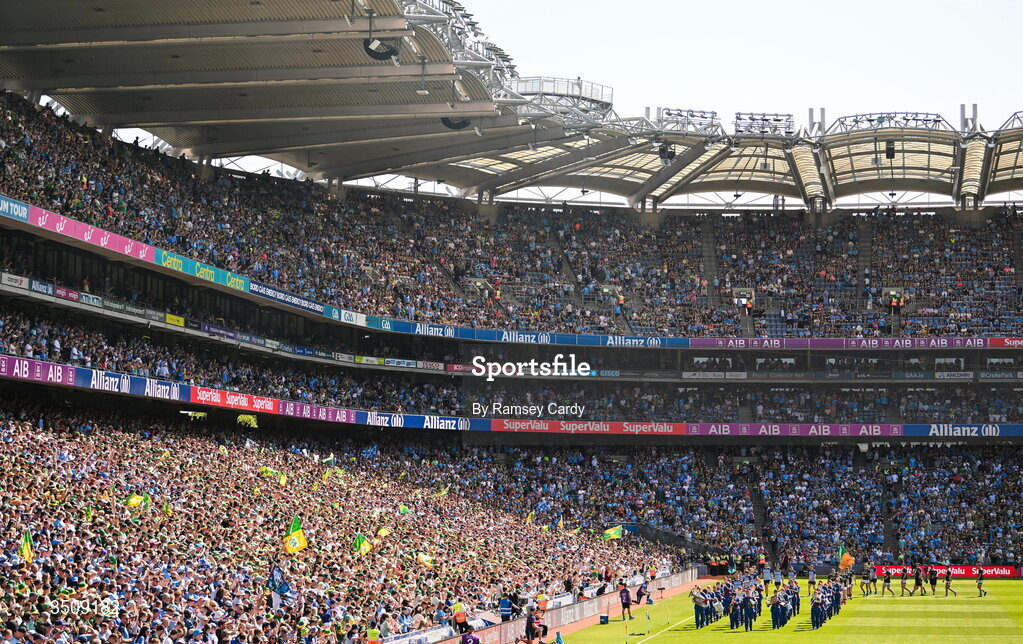 12 July 2026; The Dublin and Kerry teams parade behind The Artane Band before the GAA Football All-Ireland Senior Championship semi-final match between Dublin and Kerry at Croke Park in Dublin. Photo by Ramsey Cardy/Sportsfile