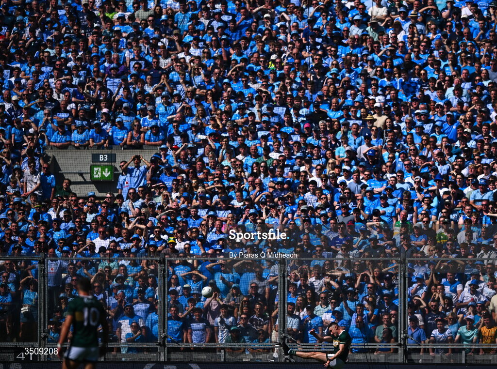 12 July 2026; Seán O'Shea of Kerry scores a point from a free as supporters on Hill 16 look on during the GAA Football All-Ireland Senior Championship semi-final match between Dublin and Kerry at Croke Park in Dublin. Photo by Piaras Ó Mídheach/Sportsfile