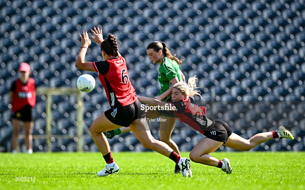 12 July 2026; Sinead Barrett of Fermanagh kicks a score despite the efforts of Orlagh Blaney, left, and Niamh McClory of Down during the LGFA TG4 All-Ireland Intermediate Championship semi-final match between Down and Fermanagh at St Tiernach’s Park in Clones, Monaghan. Photo by Tyler Miller/Sportsfile
