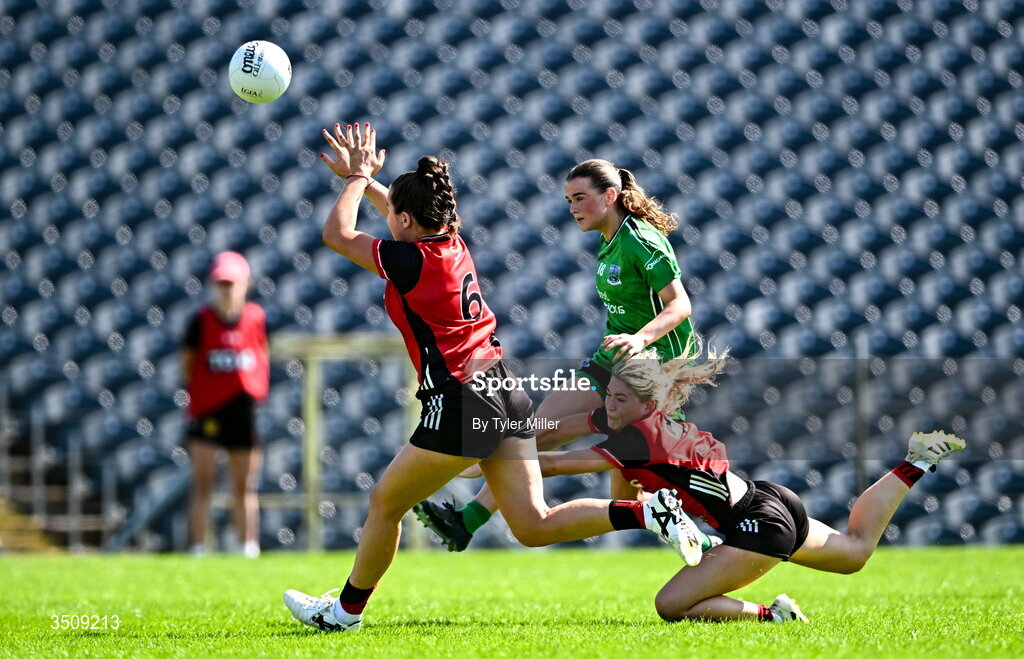 12 July 2026; Sinead Barrett of Fermanagh kicks a score despite the efforts of Orlagh Blaney, left, and Niamh McClory of Down during the LGFA TG4 All-Ireland Intermediate Championship semi-final match between Down and Fermanagh at St Tiernach’s Park in Clones, Monaghan. Photo by Tyler Miller/Sportsfile