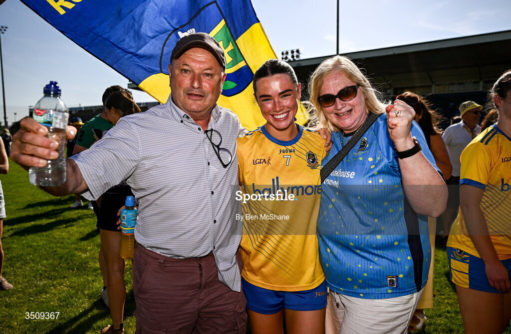 12 July 2026; Ella Thompson of Roscommon celebrates with her parents Dixie and Fiona after the LGFA TG4 All-Ireland Intermediate Championship semi-final match between Roscommon and Westmeath at Kingspan Breffni in Cavan. Photo by Ben McShane/Sportsfile
