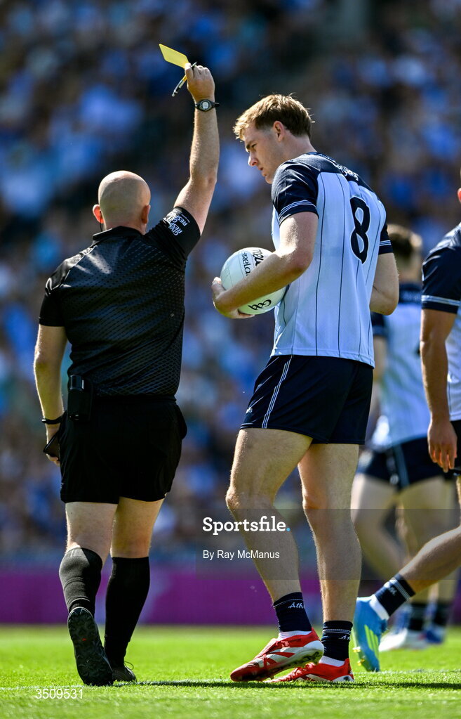 12 July 2026; Referee Brendan Cawley issues a yellow card to Peadar Ó Cofaigh Byrne of Dublin during the GAA Football All-Ireland Senior Championship semi-final match between Dublin and Kerry at Croke Park in Dublin. Photo by Ray McManus/Sportsfile