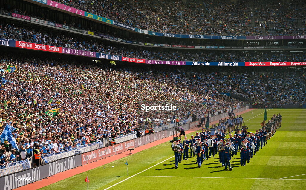 12 July 2026; The Dublin and Kerry teams parade behind The Artane Band before the GAA Football All-Ireland Senior Championship semi-final match between Dublin and Kerry at Croke Park in Dublin. Photo by Ramsey Cardy/Sportsfile