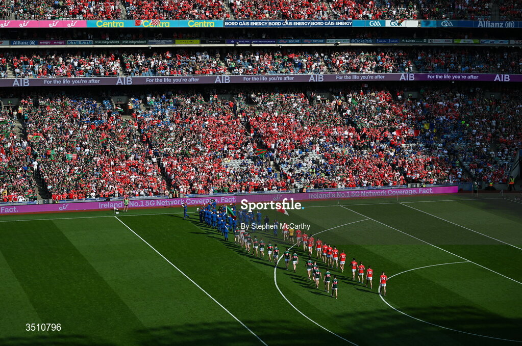 11 July 2026; The teams walk behind The Artane Band in the pre-match parade before the GAA Football All-Ireland Senior Championship semi-final match between Mayo and Louth at Croke Park in Dublin. Photo by Stephen McCarthy/Sportsfile