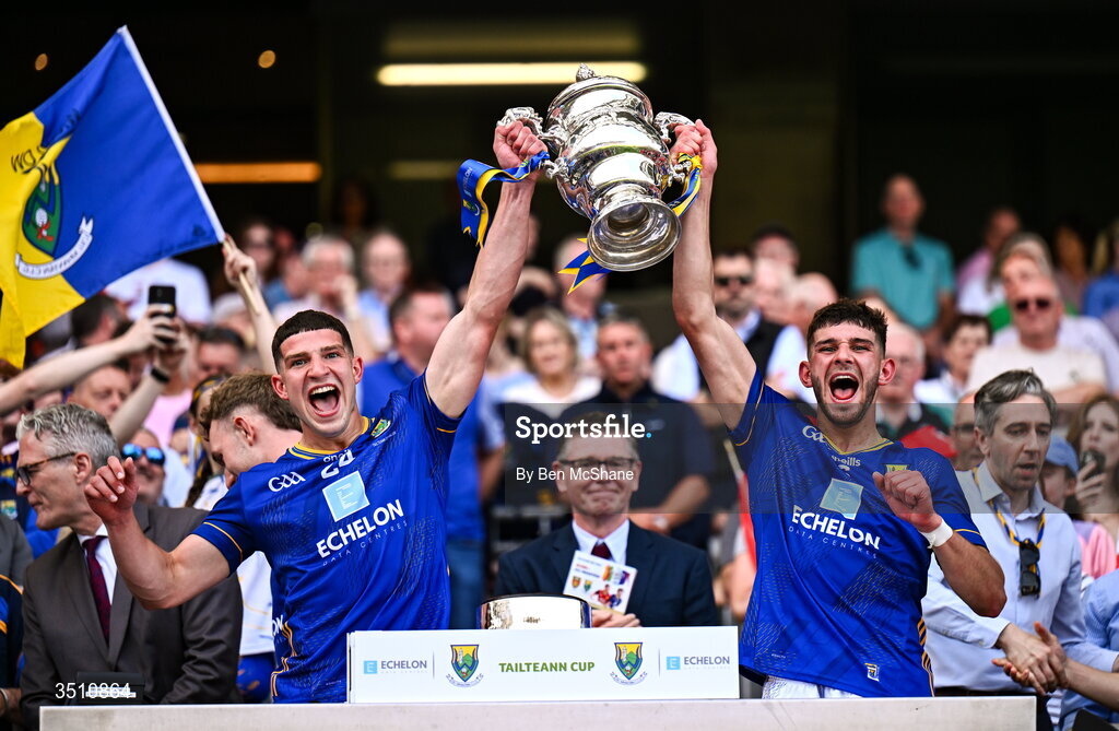 11 July 2026; Conor Fee, left, and Darragh Fee of Wicklow lift the Tailteann Cup after the Tailteann Cup final match between Down and Wicklow at Croke Park in Dublin. Photo by Ben McShane/Sportsfile