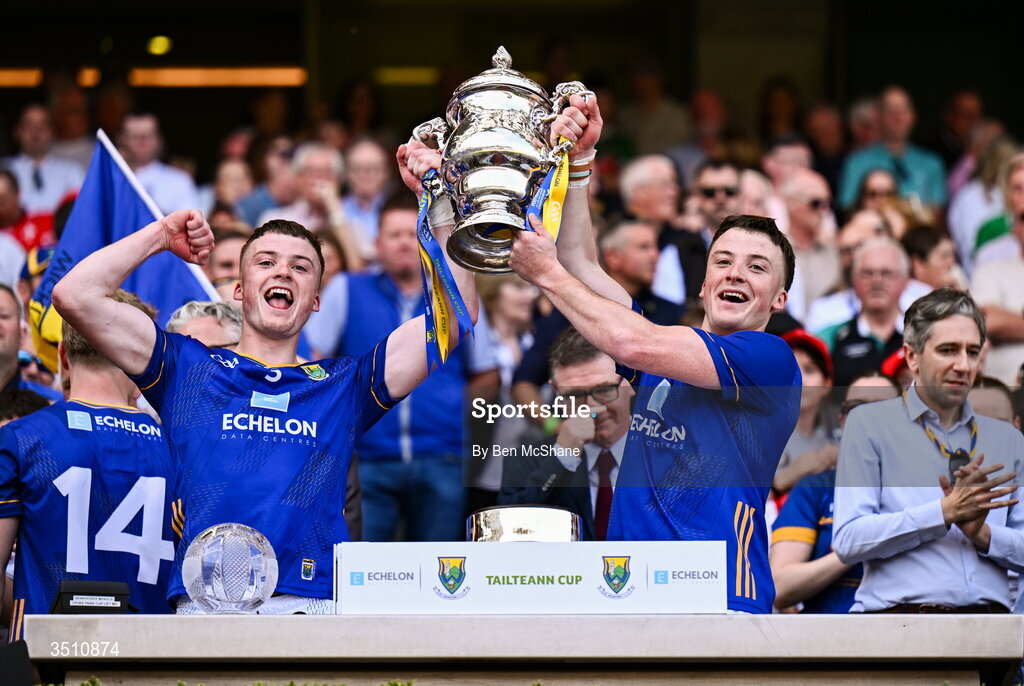 11 July 2026; Matt Nolan, left, and John Paul Nolan of Wicklow lifts the Tailteann Cup after the Tailteann Cup final match between Down and Wicklow at Croke Park in Dublin. Photo by Ben McShane/Sportsfile