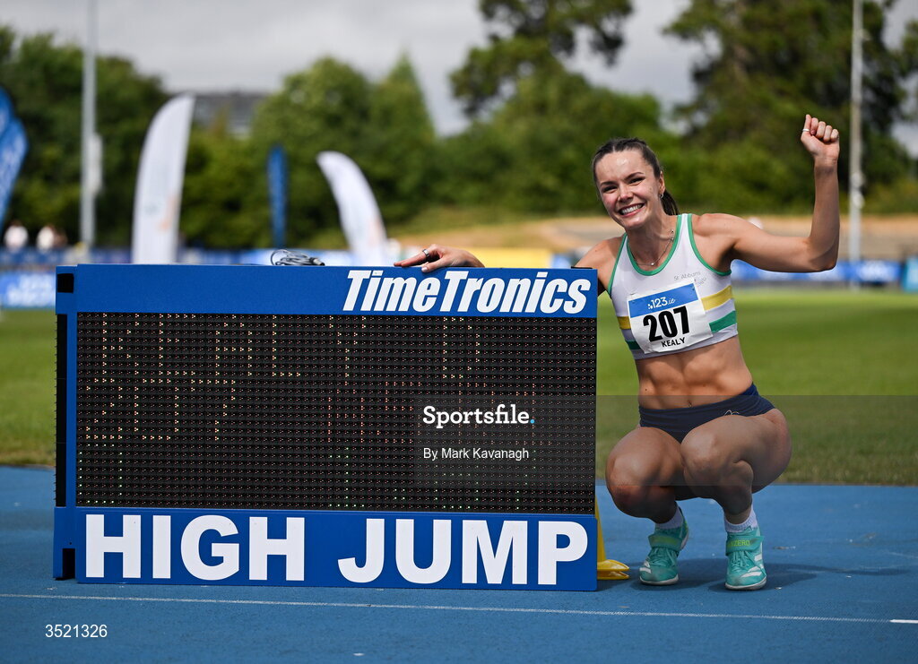 25 July 2026; Daena Kealy of St. Abbans A.C. poses with the scoreboard after winning the high jump after setting a new PB and national lead of 1.87m during day one of the 123.ie National Senior Track & Field Championships 2026 at Morton Stadium in Dublin. Photo by Mark Kavanagh/Sportsfile