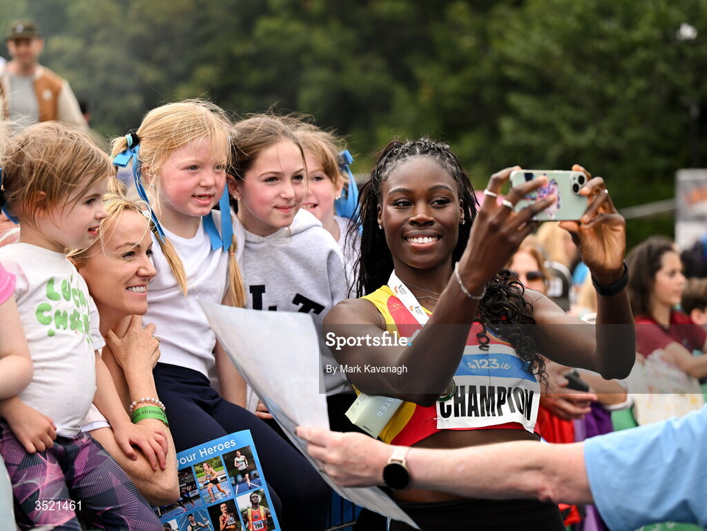 25 July 2026; Rhasidat Adeleke of Tallaght A.C. signs autographs after her win in the 200m during day one of the 123.ie National Senior Track & Field Championships 2026 at Morton Stadium in Dublin. Photo by Mark Kavanagh/Sportsfile