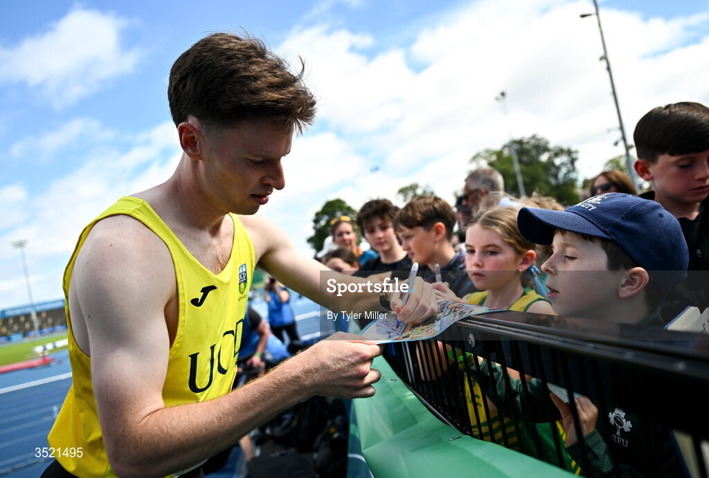 25 July 2026; Cian McPhillips of U.C.D. A.C., Dublin, with supporters after competing in the men's 800m heats during day one of the 123.ie National Senior Track & Field Championships 2026 at Morton Stadium in Dublin. Photo by Tyler Miller/Sportsfile