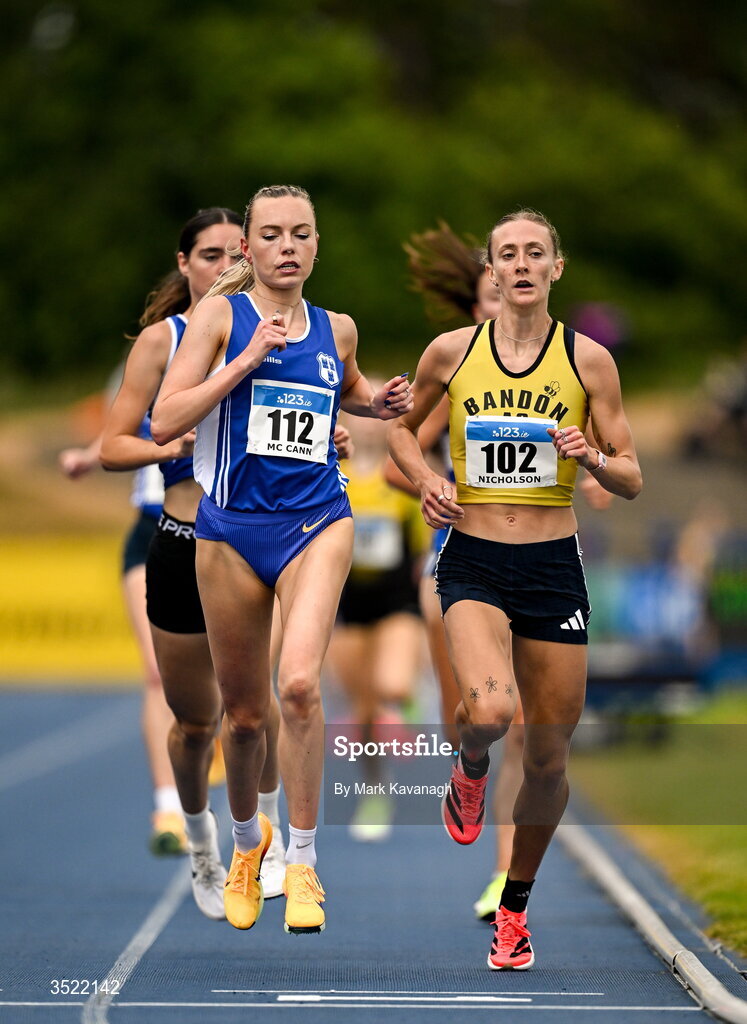 25 July 2026; Jodie McCann of Dublin City Harriers A.C., left, and Laura Nicholson of Bandon A.C.  competing in the 1500m heats during day one of the 123.ie National Senior Track & Field Championships 2026 at Morton Stadium in Dublin. Photo by Mark Kavanagh/Sportsfile